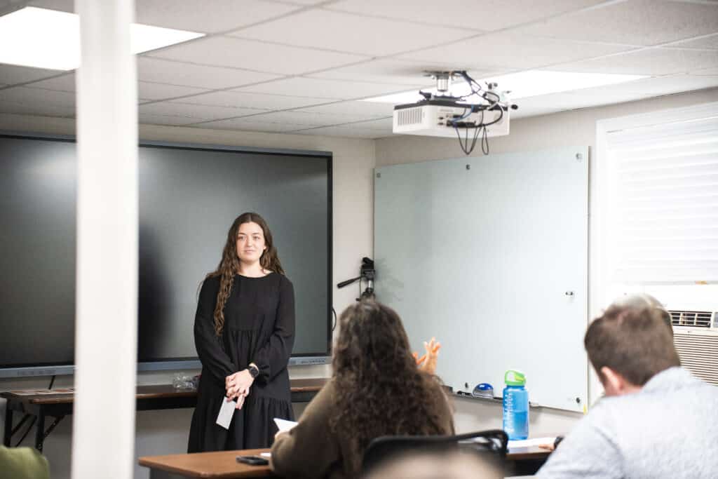 A student presenting in class.