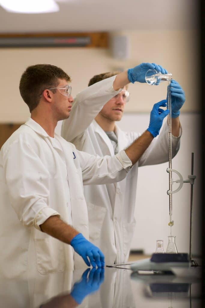 two Toccoa Falls College students in biology lab