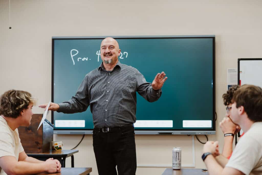 A professor teaching a class.