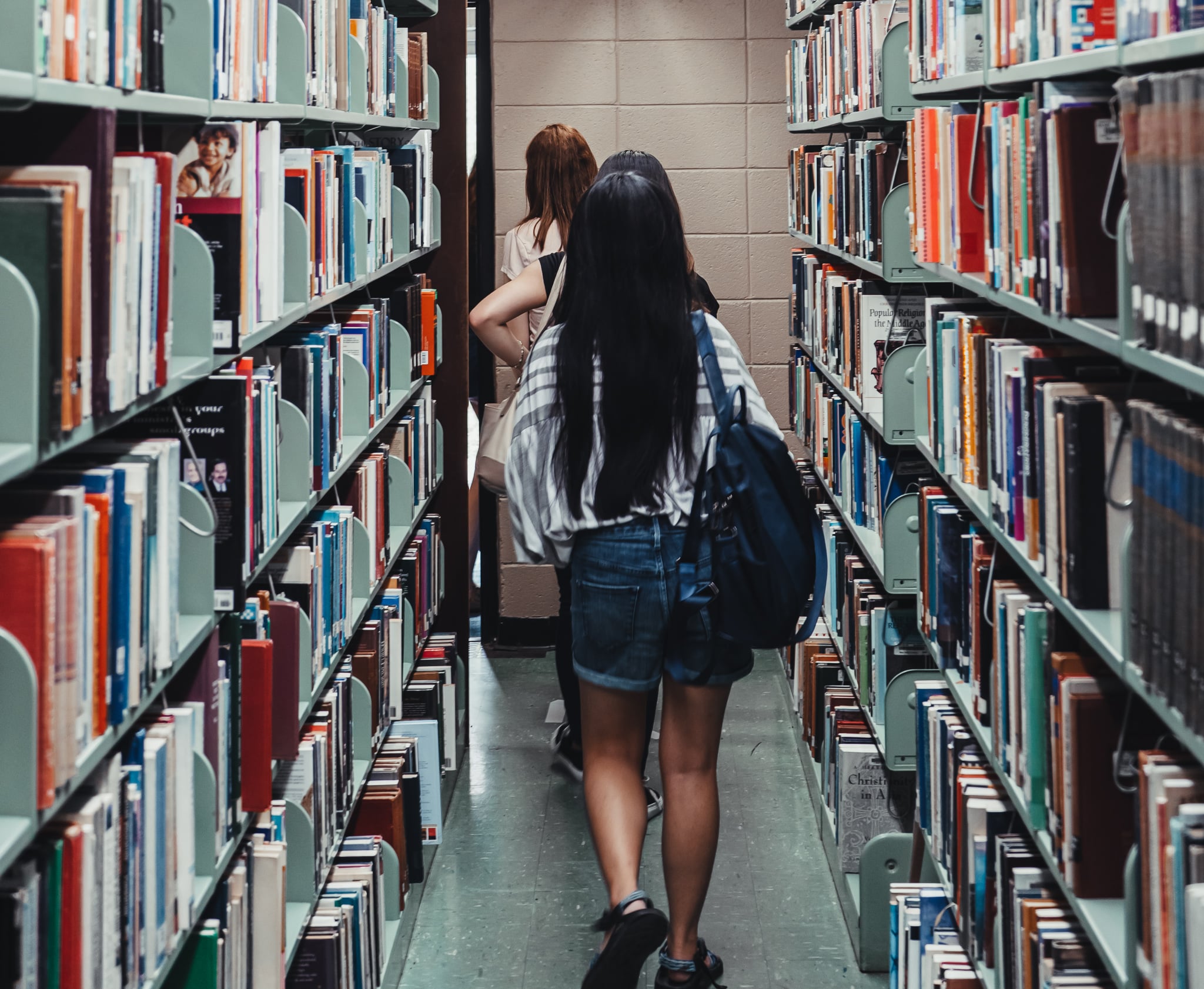 Toccoa Falls students walking through library