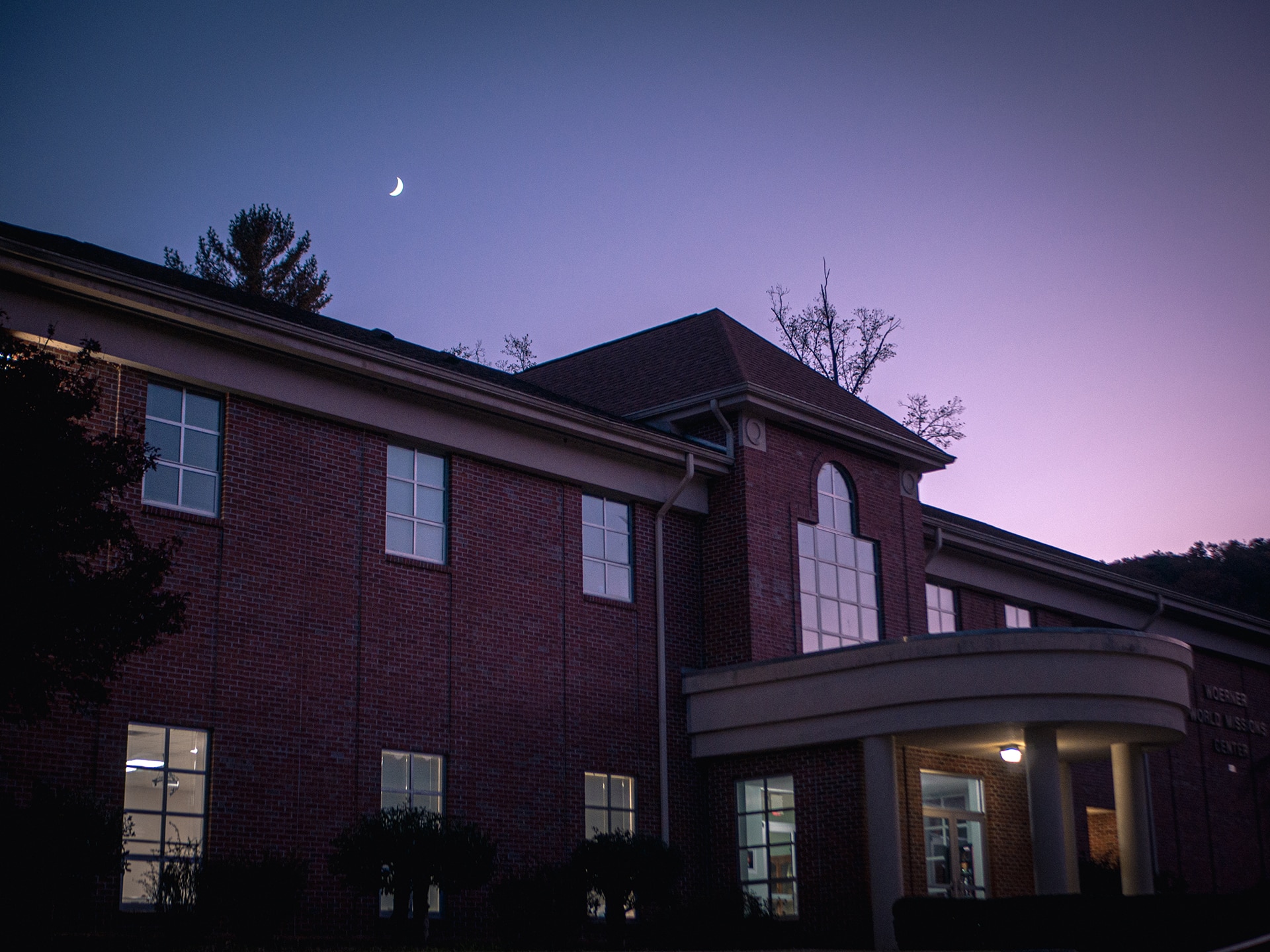 Exterior of a brick building at night