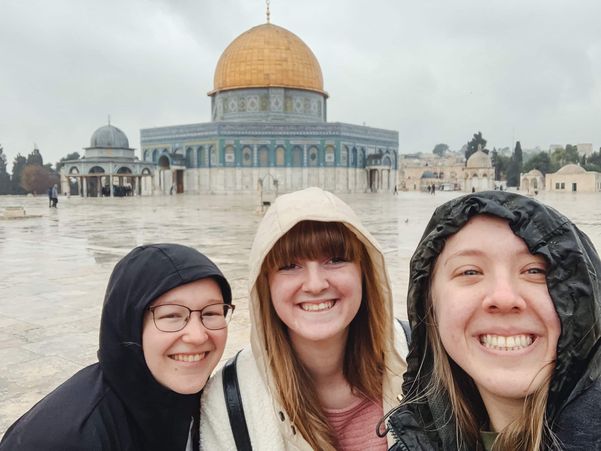 Toccoa Falls College pose for a picture outside the Dome of the Rock