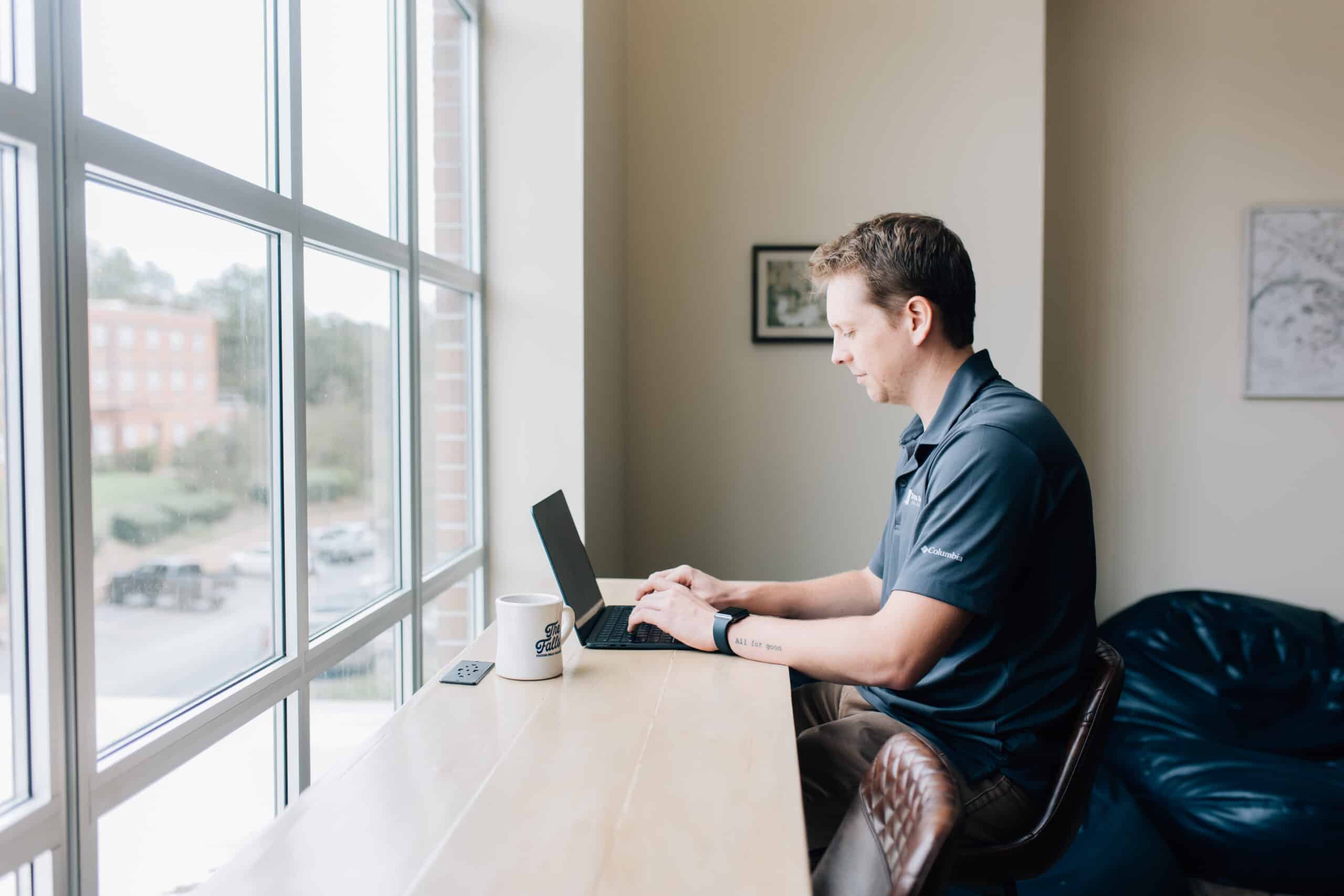 Student working at laptop