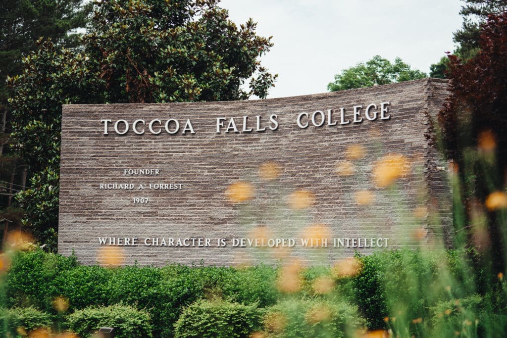 An ornate stone sign with the words 
