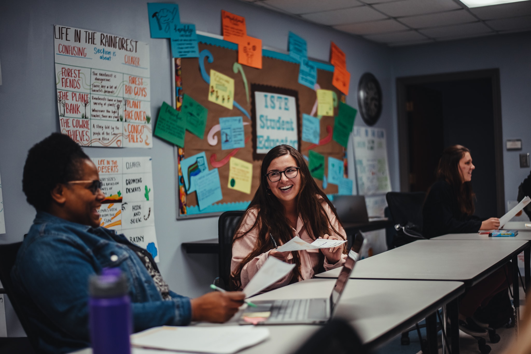 Student with professor in classroom