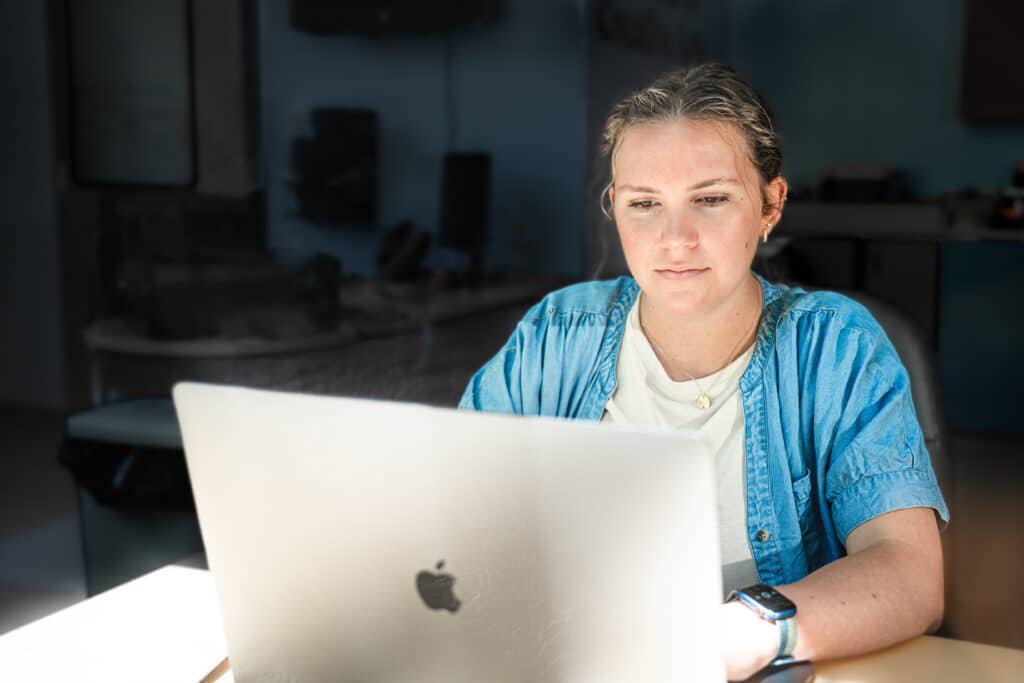 student working on laptop