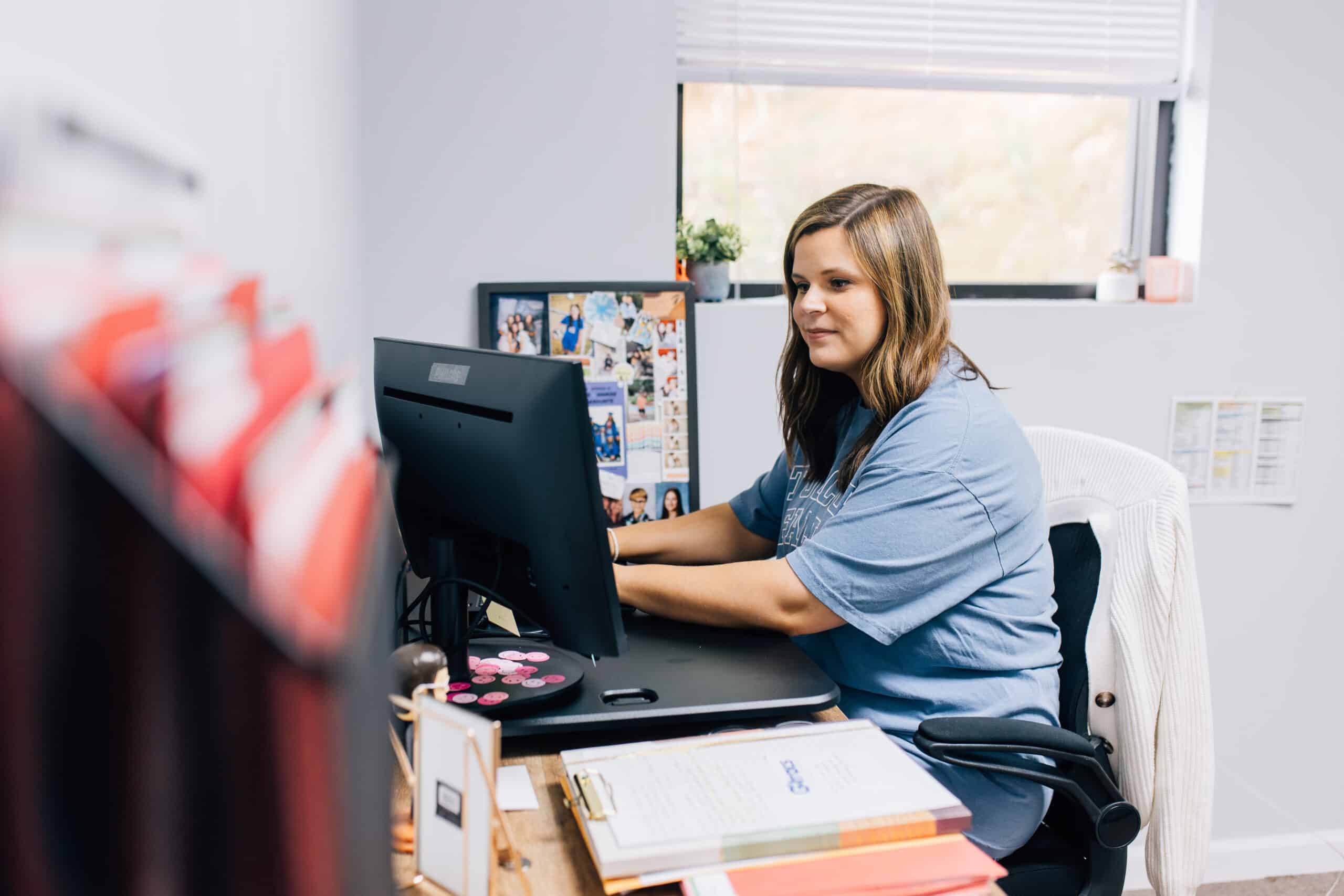 A student working on her computer.