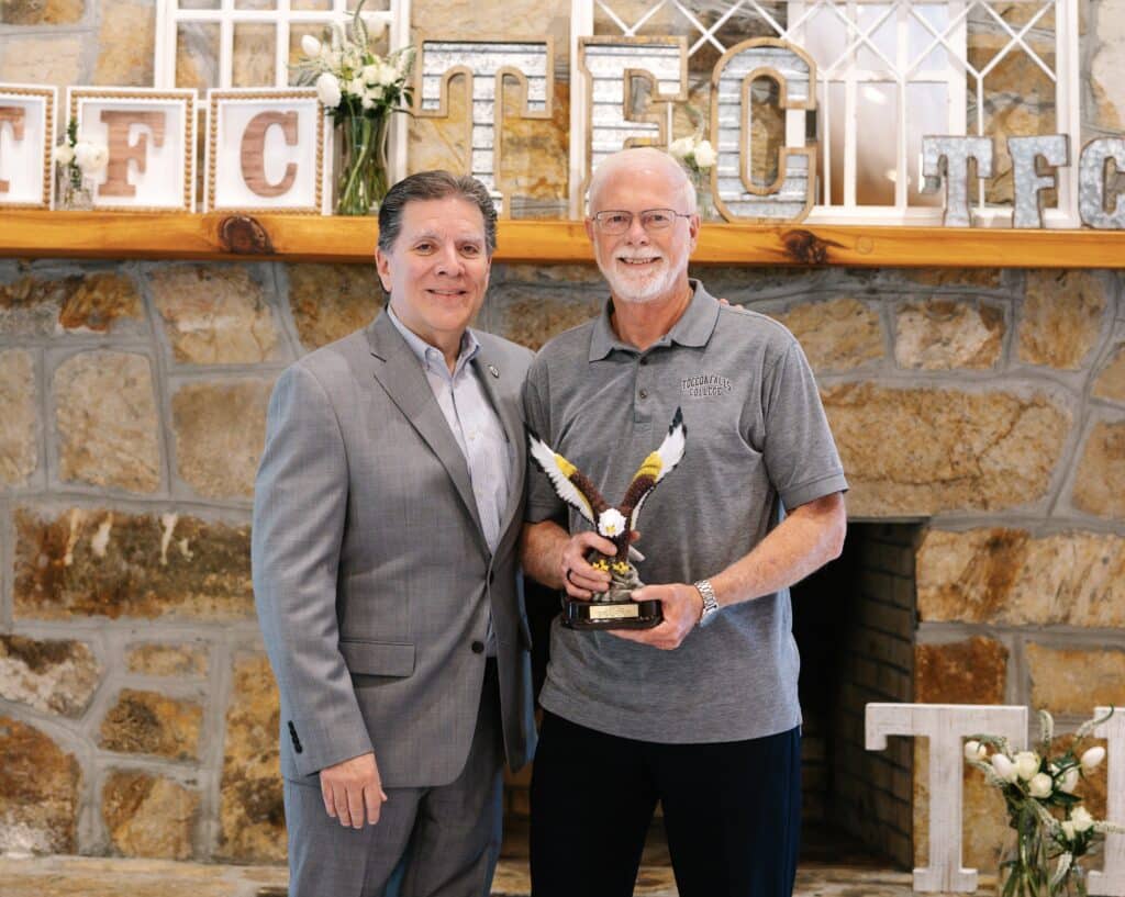 Dr. Bob Myers with retiree Jarvis Crosby