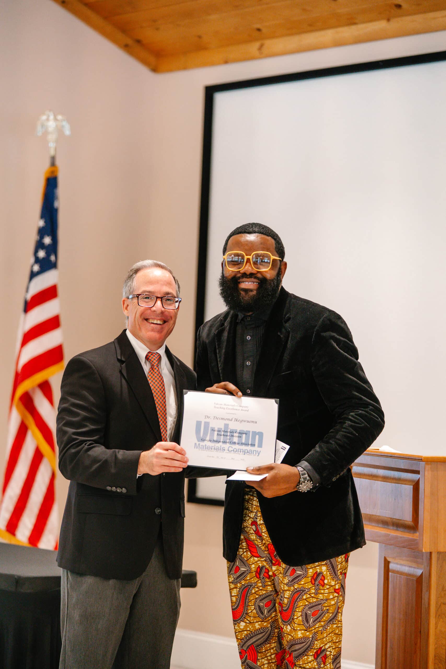 Man presenting award 